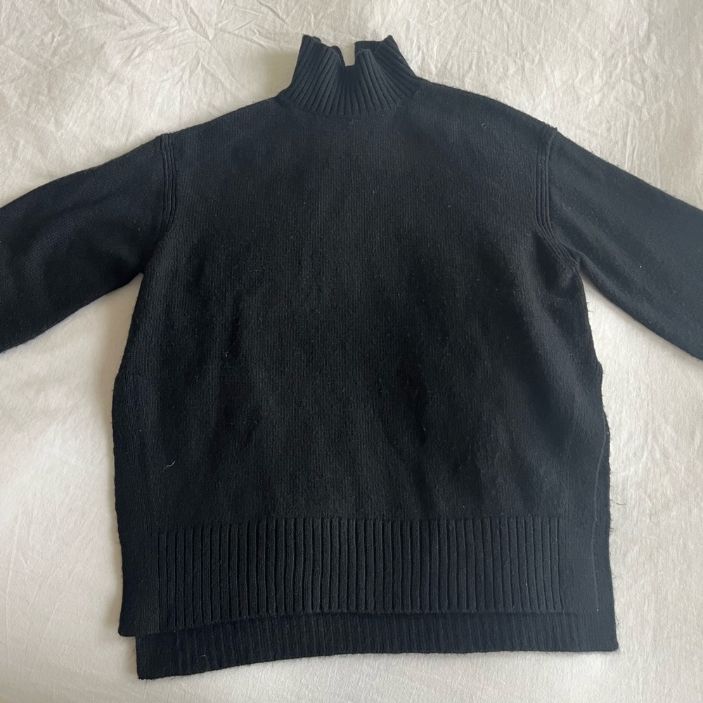 Black turtleneck sweater